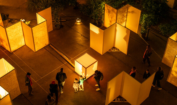 Overhead view of a labyrinth of fabric panels and light